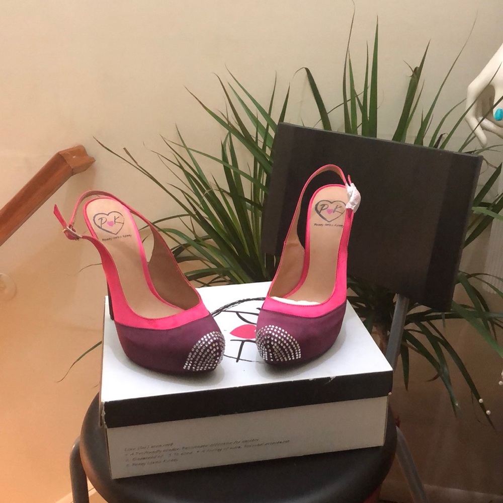 Penny loves Kenny shoes. Purple and pink! Size 8